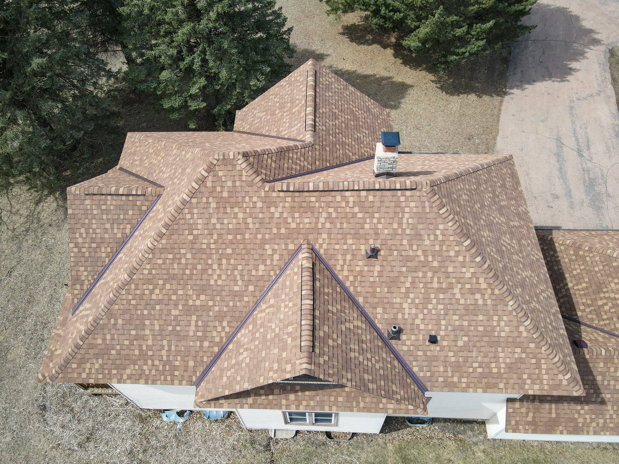 Drone photo of shingle roof from upper corner angle