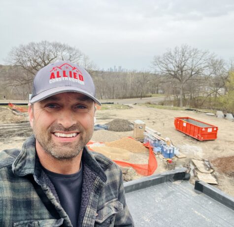 Eric from Allied Construction on-site during a flat roof installation. Showcasing hands-on leadership and expert oversight in every project.