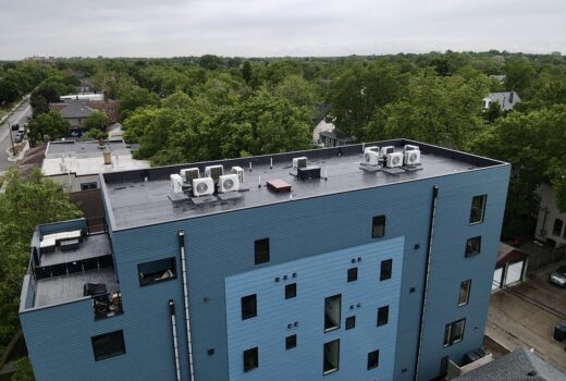 Close aerial view of the rooftop of Bryant Ave Lofts featuring HVAC systems.