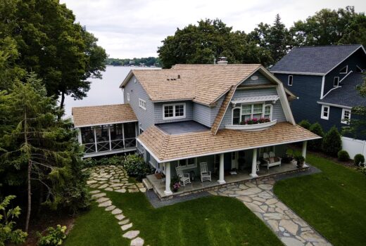 Lakeside Minnesota home with new Brava synthetic shake roof installed by Allied Construction.